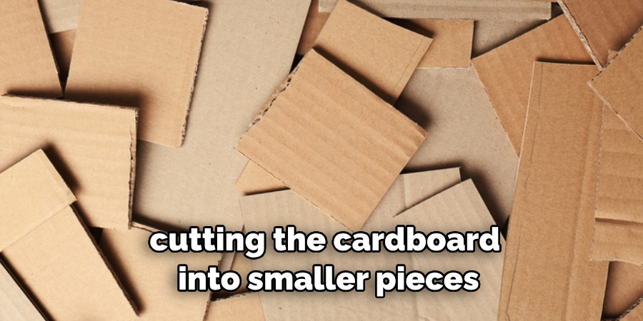 cutting the cardboard into smaller pieces