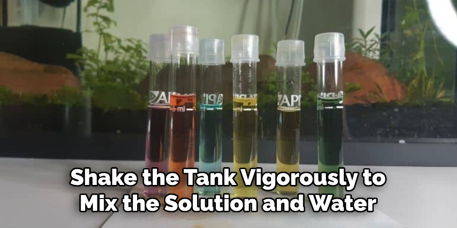 Shake the Tank Vigorously to Mix the Solution and Water