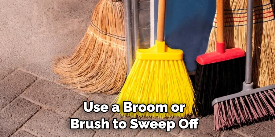Use a Broom or Brush to Sweep Off 