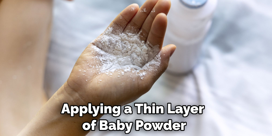 Applying a Thin Layer of Baby Powder