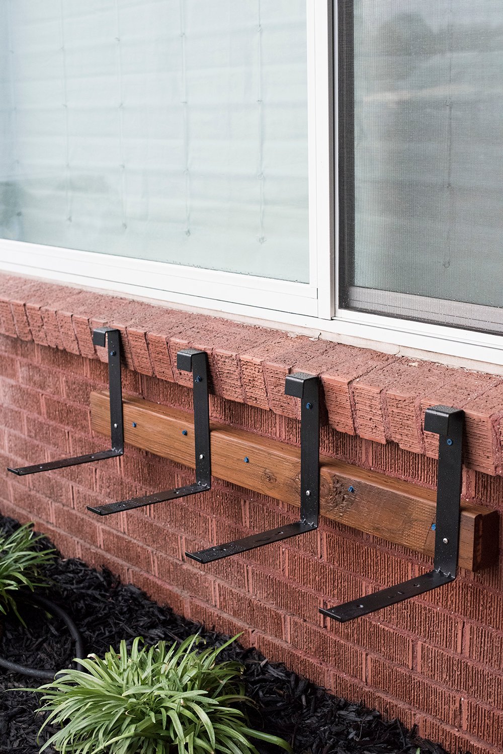 How to Hang a Window Box on Brick